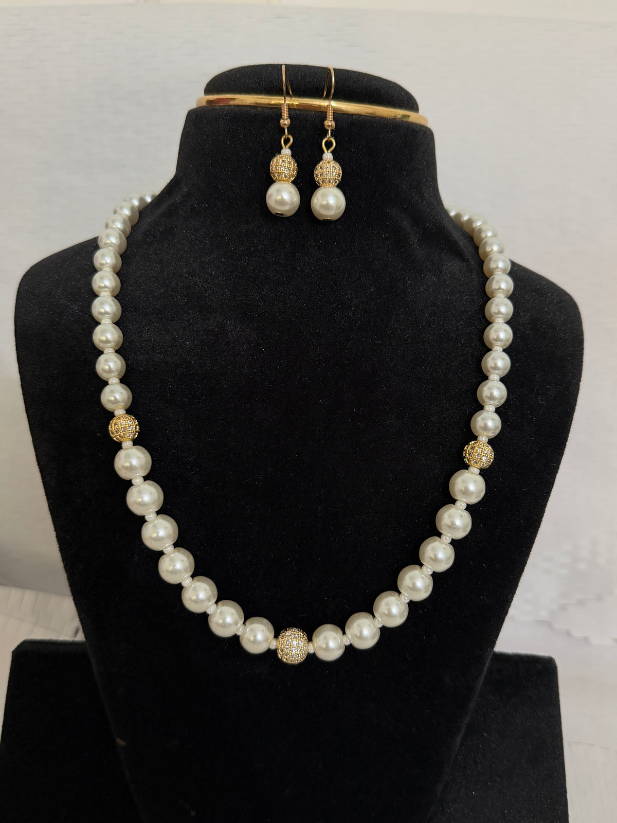 White Pearl Necklace and Matching Earrings With Gold Textured Accents - view 2