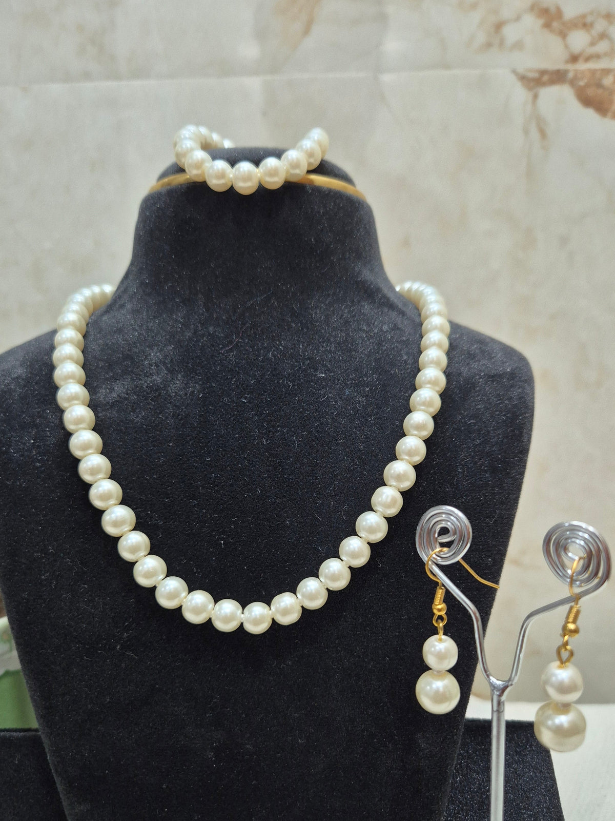 4 Piece White Pearl Set - Necklace, Earrings, Bracelet.