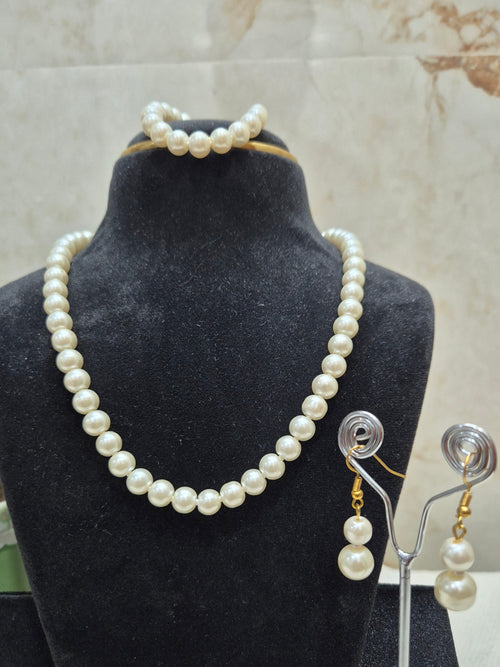 4 Piece White Pearl Set - Necklace, Earrings, Bracelet.